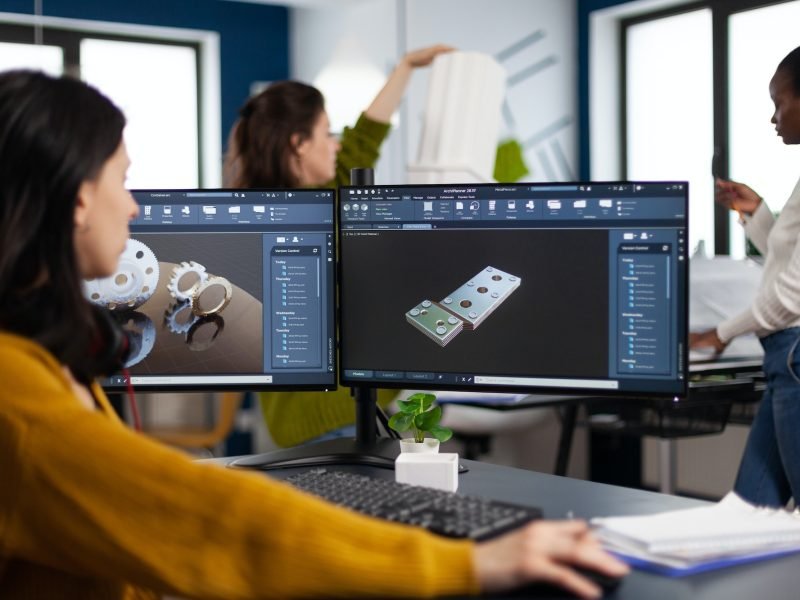 industrial-engineer-woman-working-at-pc-with-two-monitors-screens-showing-cad-software.jpg industrial-engineer-woman-working-at-pc-with-two-monitors-screens-showing-cad-software.jpg